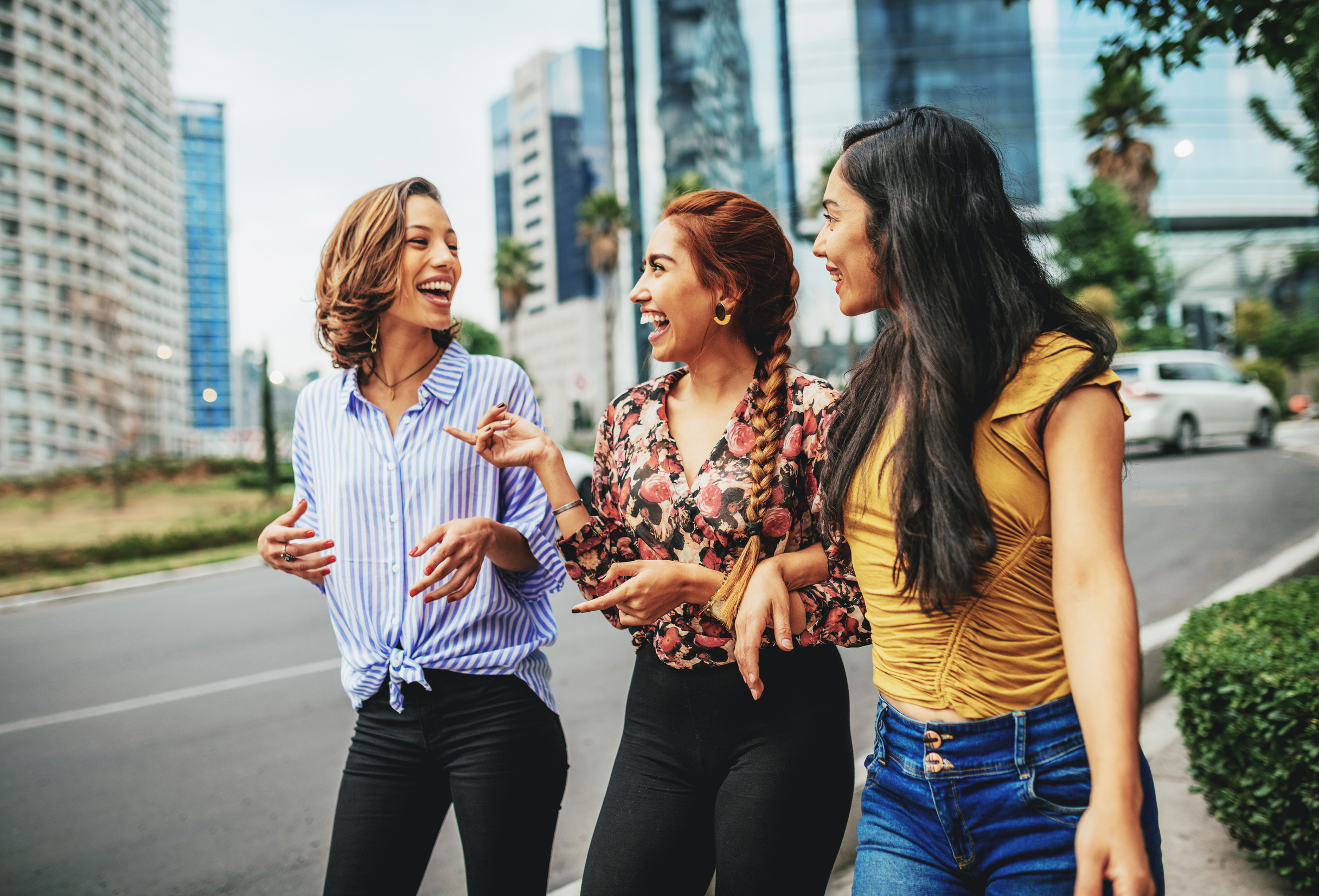 Young Latina women traveling together for a city break