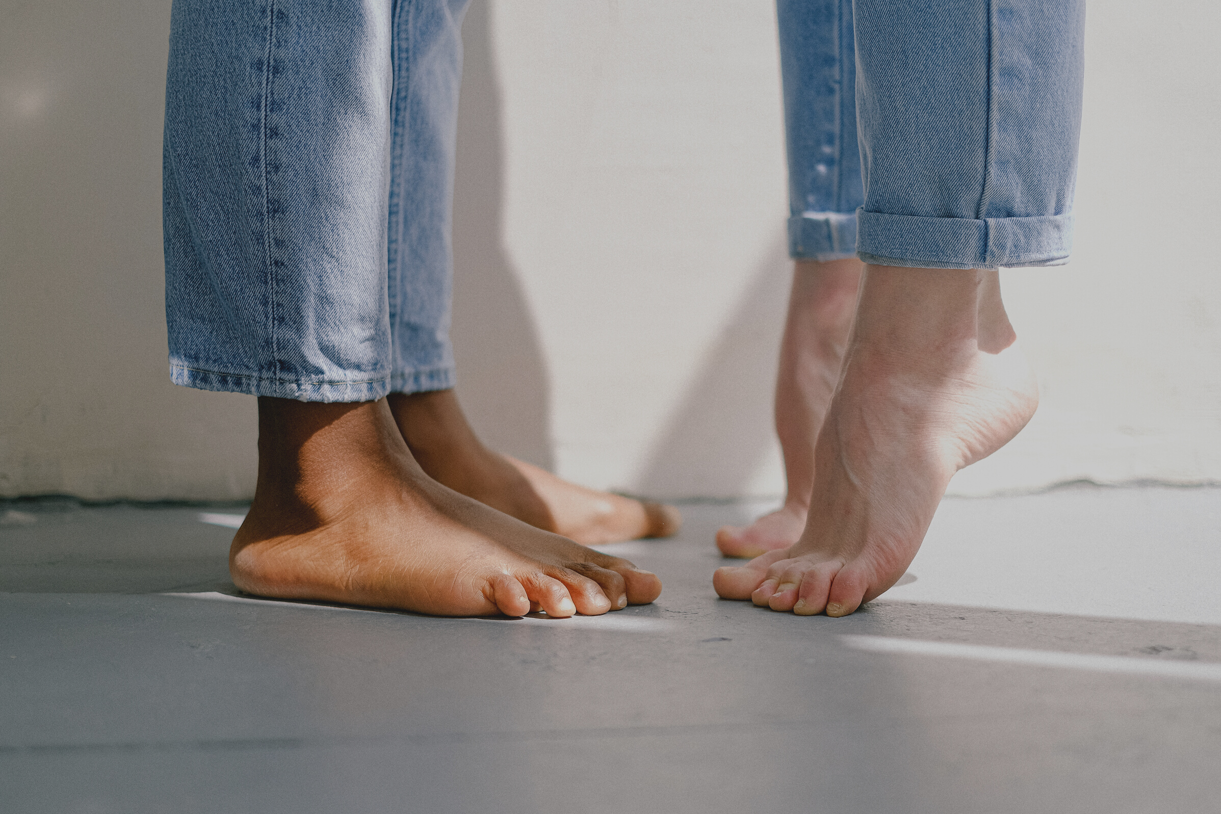 Bare Feet on Concrete Floor